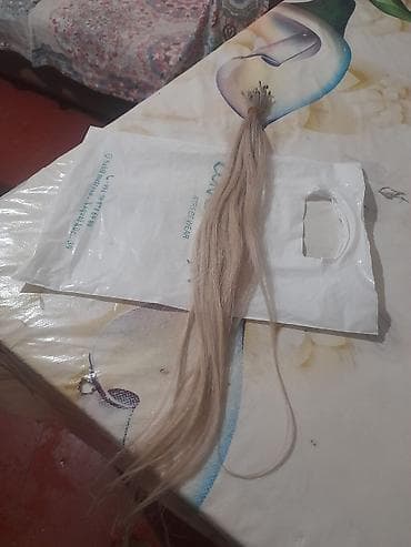 Şəxsi əşyalar: Açıq sarı rəngdə, ucu kapsullu (keratin uclu) saç tutumu. - Təxminən — 1