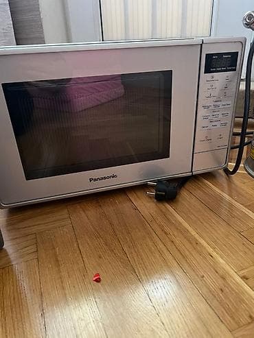 soyuducu metbex: Mikrodalğalı soba Panasonic, Ayrıca dayanan, Mikrodalğalar ilə, rəng - Gümüşü — 1