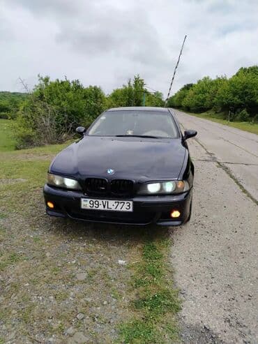 suse balon: BMW 5 Seriyası (E39) sedan - Kuzov: qara rəng, M paket ön bamper və — 1