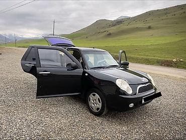 растаможка авто: Lifan 320, 5 qapılı kompakt hetçbek. Xarici: - Qara rəng, xrom qapı — 2