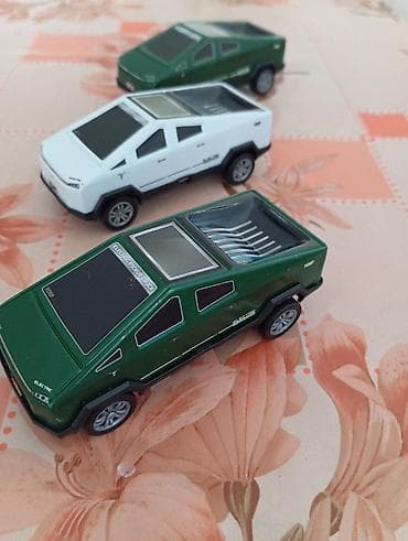 depozitli masinlar: Ilon Maskin balaca plastmasli pikap avtomobil modelləri (elektrik — 3