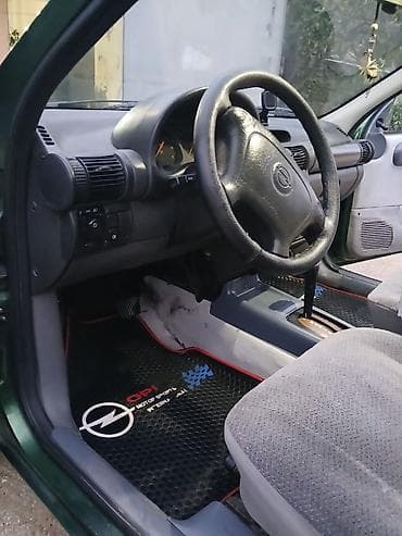 nissan note 1999: Opel Astra Caravan (ya da Astra F Universal) – yaşıl rəngli, 5 qapılı — 6