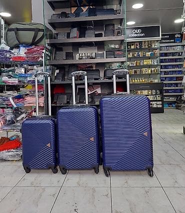 Çamadanlar: Səyahət üçün 3-lü çamadan dəsti - Rəng: tünd mavi, diagonal — 1