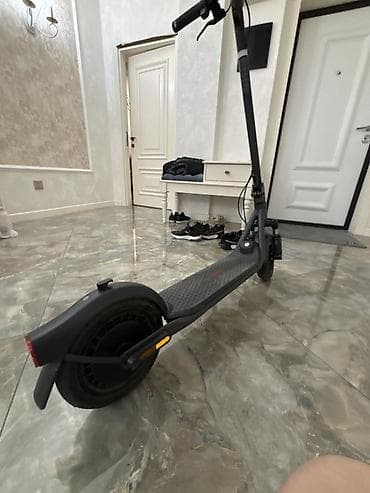 Elektrik nəqliyyatı: Ninebot elektrik skuter - Brend/model: Ninebot (gövdədə və paneldə — 4