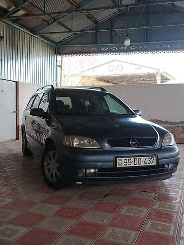 volkswagen passat nece masindi: Opel Astra: 1.6 l | 1998 il 400 km Universal — 1