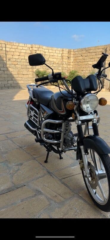 18 disk təkər: Moto: MX49 moped/motosiklet Xüsusiyyətlər: - Rəng: qara, dekorativ — 1