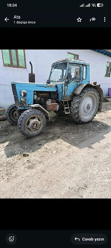 bmw mühərrik: Mavi rəngli MTZ tipli təkərli traktor - Kabinəli, yan çıxışlı şlanqlı — 1