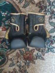 boks elcekleri qiymeti: Boks əlcəyi Təzədir 12 razmer 35 AZN Məhsul təsviri: - Brend: Venum — 2