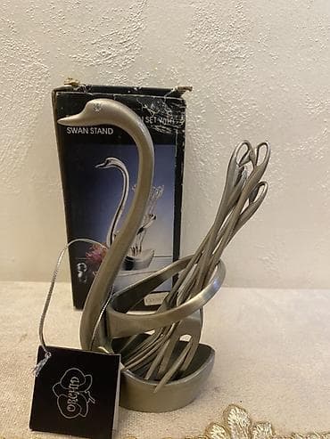 süfre: 2 ədəddir. Gümüşü qu quşu desenli limon götürən — 2