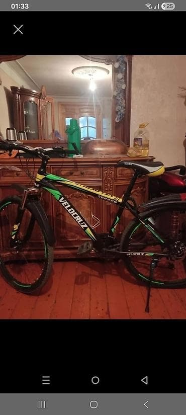 Velocruz dağ velosipedi - Rənglər: qara-yaşıl-sarı qolorlarda idman