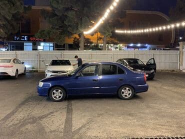 Hyundai Accent: 1.6 l | 2001 il Sedan — 6