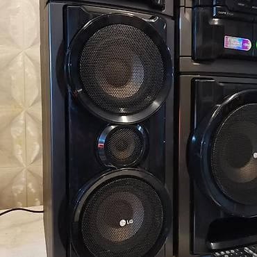 mikrofon tutucu: LG ev audio sistemi – güclü çoxkomponentli Hi‑Fi set Xüsusiyyətlər: - — 9