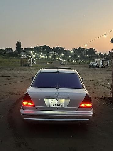 bmw e36 angel: Mercedes-Benz C-Class: 2.3 l | 1998 il Sedan — 5