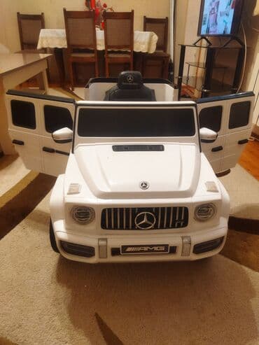 işlənmiş uşaq masinlari: Ağ rəngdə, Mercedes-Benz AMG G63 modelinə bənzər uşaq elektrik — 1