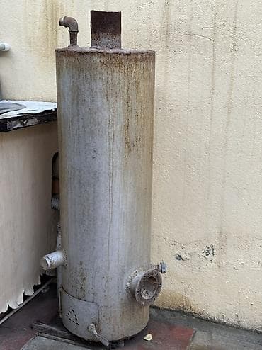 Kalonka yeniki Köhnə tip qazla işləyən su qızdırıcısı