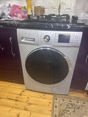 Avto xidmətlər: Avtomat paltaryuyan maşın – ön yükləməli, gümüşü korpus, iri qapılı — 3