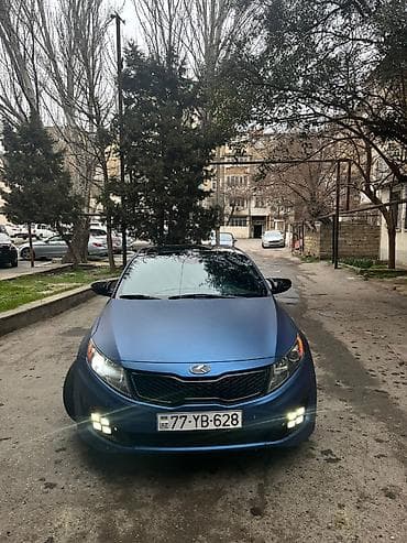 audi q3 2 tdi: Kia Optima: 2 l | 2013 il Sedan — 1