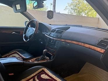 турбаза автомобиль: Mercedes-Benz E 200: 2 л | 2004 г. Седан — 4