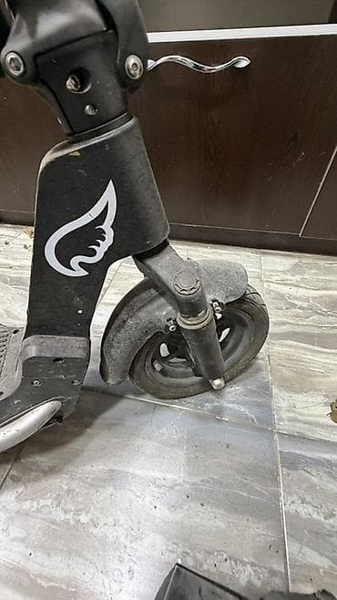 Kitablar və jurnallar: Elektrik skuter — 2