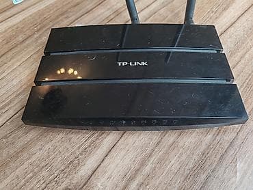 note: TP-Link 300Mbps Wireless N Gigabit ADSL2+ Modem Router (TD-W8970) Həm — 2