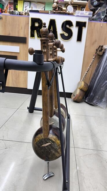 milli komanda: Kamanca yeni Rast musiqi alətləri mağazalar şəbəkəsi 3 ünvanda — 1