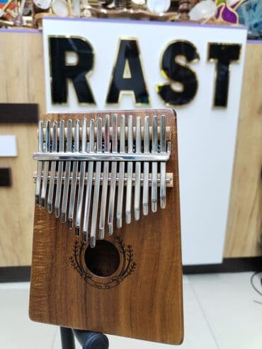 dominos sumqayit: Kalimba musiqi aləti Rast musiqi alətləri mağazalar şəbəkəsi 3 ünvanda — 1