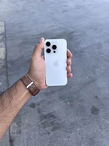 Мобильные телефоны и аксессуары: IPhone 15 Pro, 128 ГБ, White Titanium, Гарантия, Беспроводная зарядка, Face ID — 7
