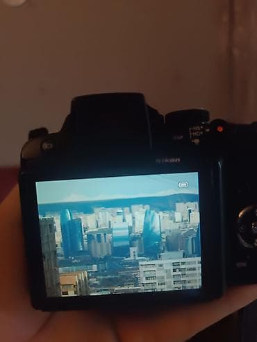 zoom: Nikon P500 kamera. Əsas xüsusiyyətlər: 12.1 MP CMOS sensor 36x optik — 4