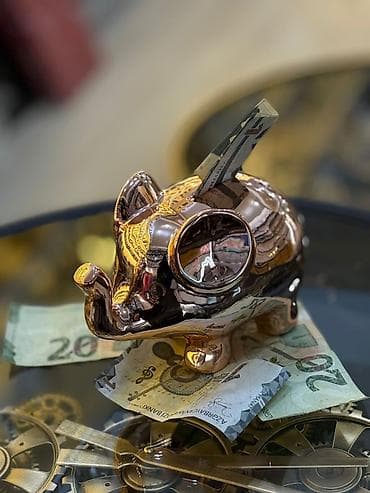 Avadanlığın icarəsi: Metallik parıltılı fil formalı pul yığan qutu (kassafon) - Material — 4