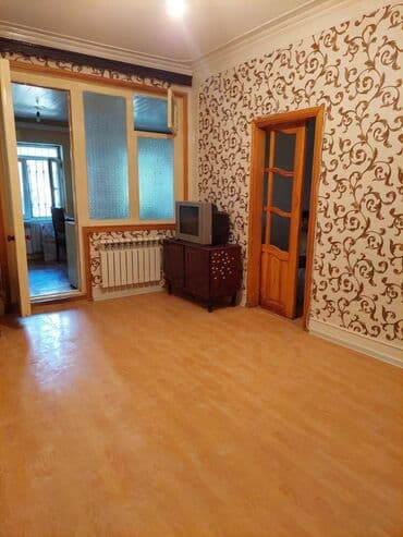 Memar əcəmi 4 mkr 5 mərtəbəli binanın 1-ci mərtəbəsində 2 otaqlı