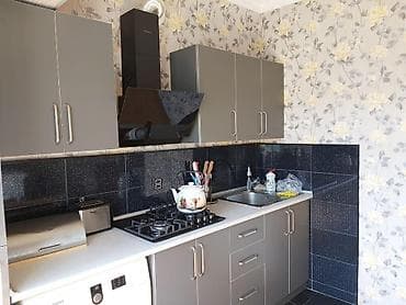 yeni gunəşli ev: Satılır yeni günəşli D massivi bina 29yerləsən 2-2ayrılmış 4 otaqlı — 2