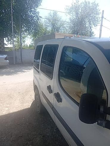 qosqular satisi: Fiat Doblo, ağ rəngli, 5 qapılı miniven/furqon. Xüsusiyyətlər: - — 7