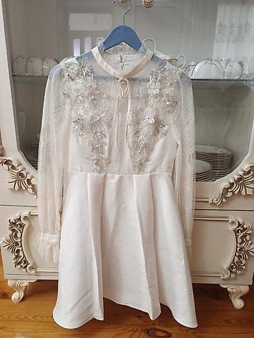 Ağ rəngli zərif qısa don heç geyinilməyib yenidir120 alınıb 90 satılır