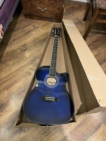 Qarmonlar: Məhsul: Akustik gitar 1 aydi alinib Tezedi 1 2 defe istifade olunub — 1