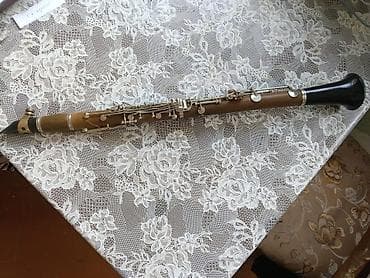 qamis: Məhsul: Klarnet (taxta korpuslu, metal mexanizmlərlə) Təsvir: - — 1