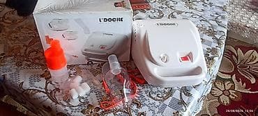 L’DOCILE inhalyator/nebulayzer cihazı. Komplektdə görünən hissələr: - — 1