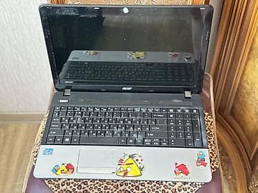 Acer noutbuk

-: təxminən 15.6" parlaq ekran
- — 1