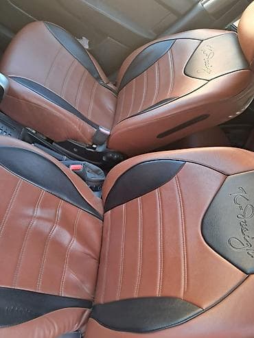 statır: Ailə üçün əlverişli 5 qapılı hetçbek. Ağ rəngli kuzov, yüngül lehimli — 5