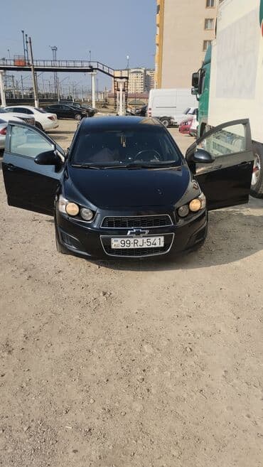 turbo az vilis: Chevrolet Aveo sedan – qara rəng, 4 qapı, AZ nömrə nişanı 99-RJ-541 — 1