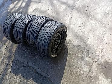 Digər nəqliyyat: Şin Roadstone 215 / 50 / R 13 — 1