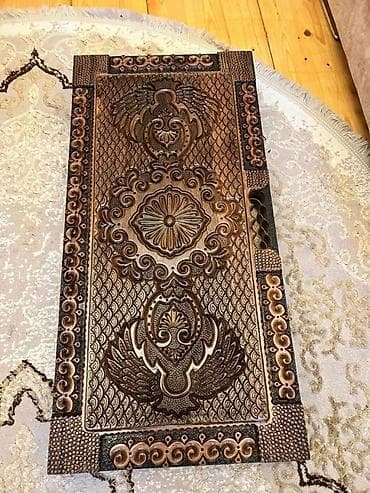 idman şort: Təsvir: - Klassik Şərq üslubunda, zəngin oyma naxışlarla işlənmiş qoz — 2