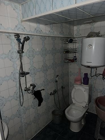 obyekt icaresi: Yerləşmə: Şəfi Sücinskin küç., 21 (küçə nişanı fotoda görünür) — 9