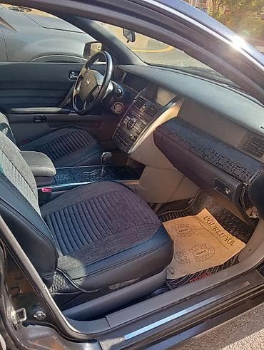man sat: Nissan Teana – qara rəngli, geniş və komfortlu sedan. Xüsusiyyətlər — 6