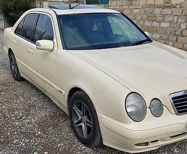 tap az avtomobillər: Mercedes-Benz E‑Class (W210) sedan - Kuzov: bej rəngli, 4 qapı — 4