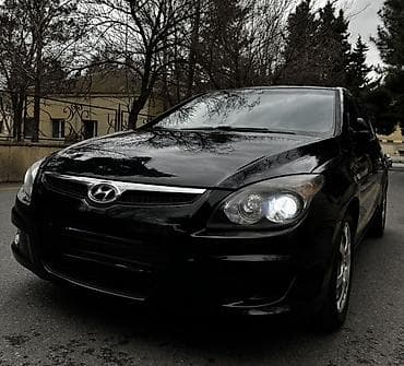 Motonəqliyyat: Hyundai i30 hatchback - Korpus: 5 qapılı, qara rəng, arxa şüşə tünd — 6