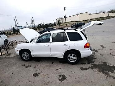 mitsubishi 2002 montero: Hyundai Santa Fe: 2.4 l | Krossover — 2