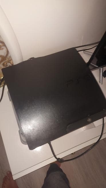 kraska pult: Sony PlayStation 3 (PS3) oyun konsolu Xüsusiyyətlər: - PS3 Slim — 1
