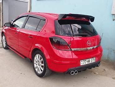 disk qabi: Opel Astra H hatchback – qırmızı rəng, 5 qapı, şəhər üçün çevik və — 1