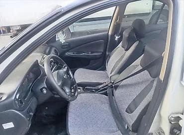 guzgu manitor: Nissan Sunny (N16) sedan – ağ rəng Xüsusiyyətlər: - Kuzov: 4 qapılı — 6