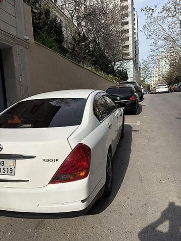 nissan versa: Nissan Teana, ağ rəngdə sedan Texniki xüsusiyyətlər: - Kuzov: sedan — 6